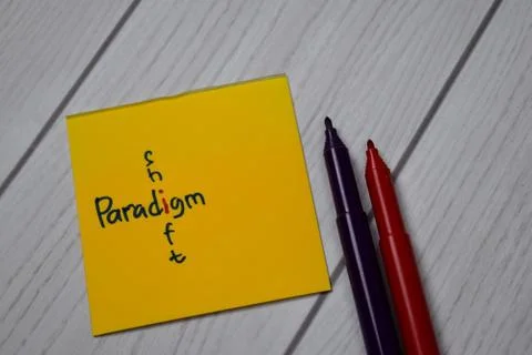 Paradigm and Shift write on sticky notes isolated on office desk Stock Photos