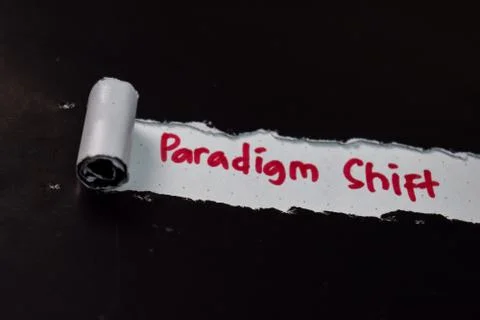Paradigm Shift Text written in torn paper Stock Photos