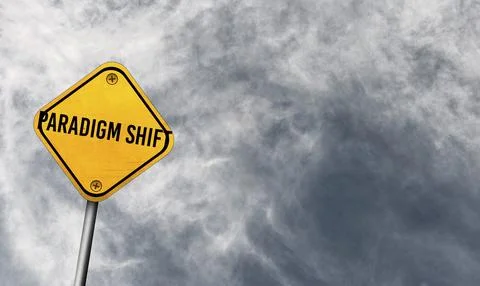 Paradigm shift, yellow sign with cloudy sky Stock Photos