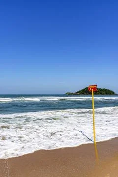 Paradise beach with danger warning from waves and sea currents Paradise be... Stock-Fotos