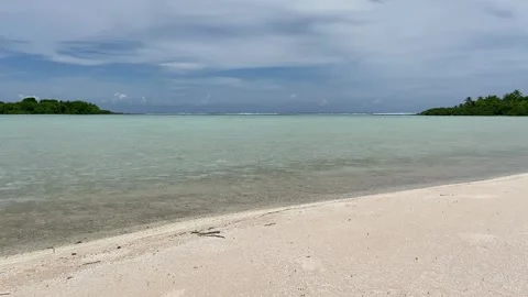 Paradise beach with pink sand in Rangiroa Stockbeeldmateriaal 344426666