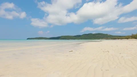 Paradise beach time lapse in the daytime with clouds Stock Footage 239288198