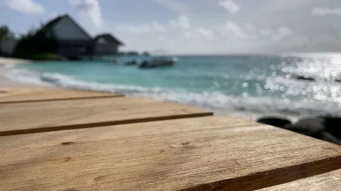 Paradise coast wood table Stock Footage 208684744