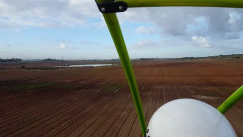 Paraglide Flight over plowed fields Vídeo Stock 264330234