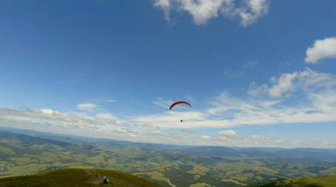 Paraglider activity fly in mountains Stock Footage 65383617