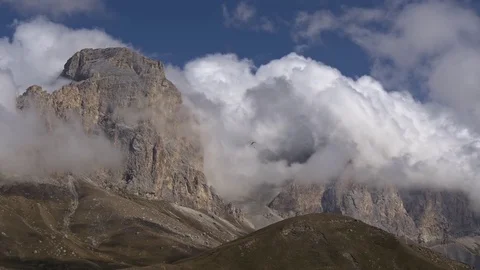 Paraglider on a background of a mountain range in the Dolomites Stock Footage 83706184