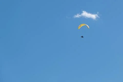 Paraglider below small cloud in the sky, nobody, copy space Stock Photos
