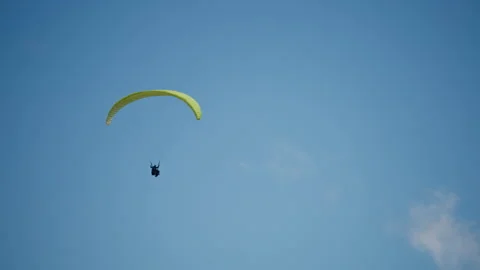 Paraglider in the blue sky Stock Footage 172533273