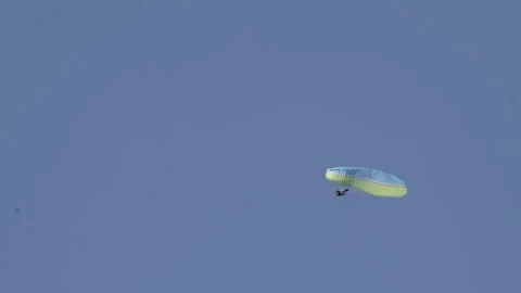 Paraglider breaks his wing and starts falling from the sky. Skydiving Stock Footage 201303029
