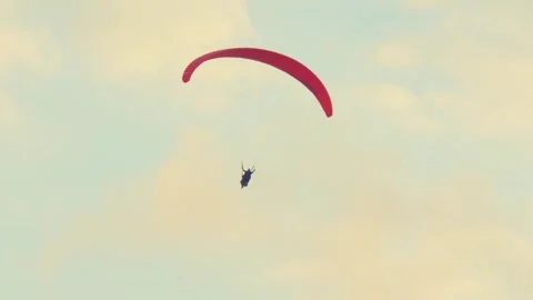 Paraglider in a Cloudy Sky Stock Footage 293305820