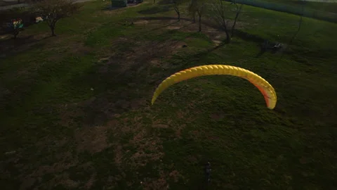 Paraglider control from the ground, drone overview Stock Footage 252174093