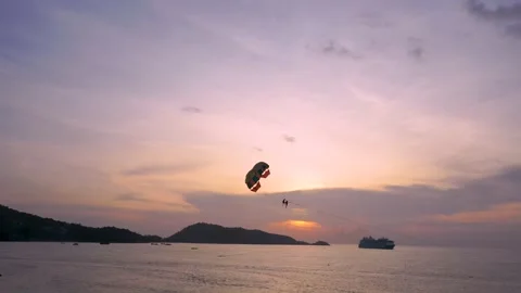 Paraglider during sunset at Patong Beach near Phuket, Thailand. Stock Footage 147286245