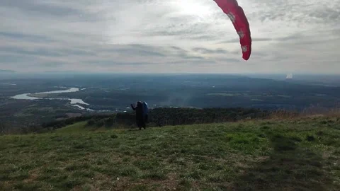 Paraglider fails to take off Stock Footage 253310639