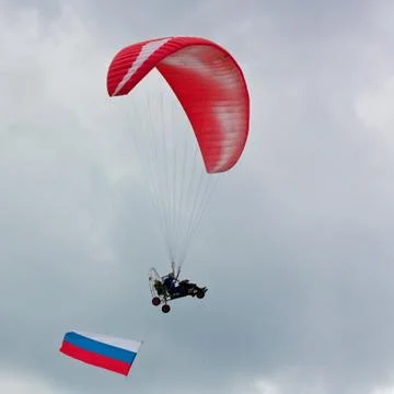 Paraglider with flag 写真素材