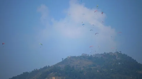 Paraglider flies Stock Footage 99955498