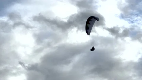 A paraglider fly over mountain top at Bald Hill lookout, Sydney Australia Stock Footage 197293476