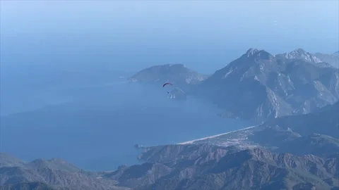 Paraglider flying between the mountains. Stock Footage 281055901
