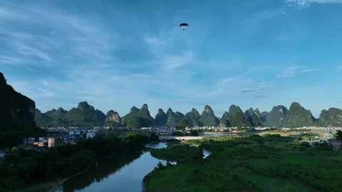 Paraglider Flying Over Karst Mountain Peaks In Yangshuo Guilin Stock Footage 313063961