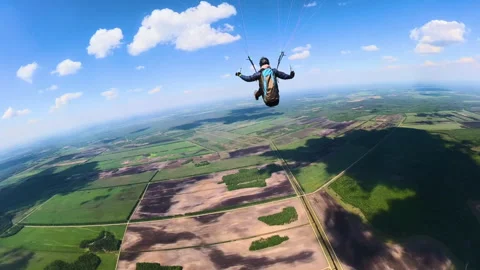Paraglider flying over plains, fields, meadows and forests of Belarus Stock Footage 244658619