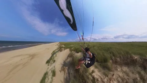 Paraglider Flying Side Ways at High-Speeds on Beach in The Netherlands on Stock Footage 286405146