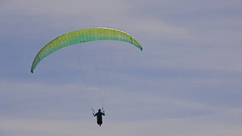 Paraglider flying in the sky Video stock 87807683