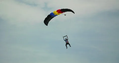 Paraglider flying in the sky Stock Footage 337574243