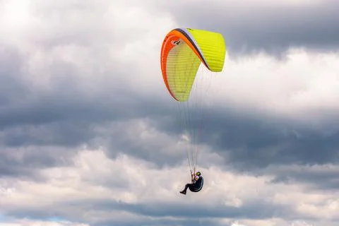 Paraglider flying in the sky Stock Photos
