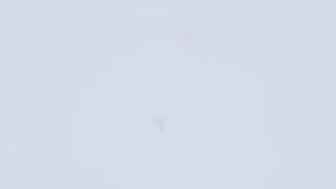 Paraglider in fog Video stock 323387192