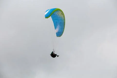 Paraglider in front of clouds 5 Stock Photos