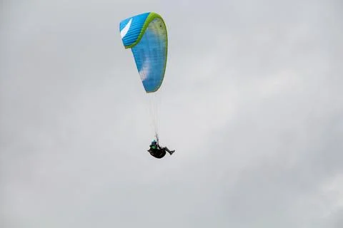 Paraglider in front of clouds 6 Stock Photos