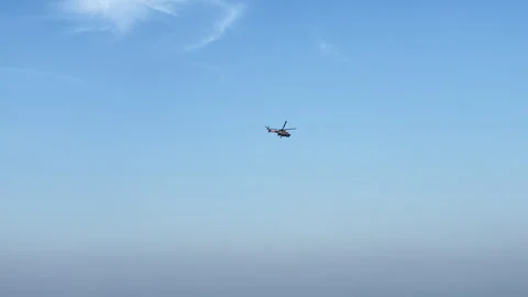 Paraglider gliding in the clear blue sky. Adventure vacation Video stock 289006495