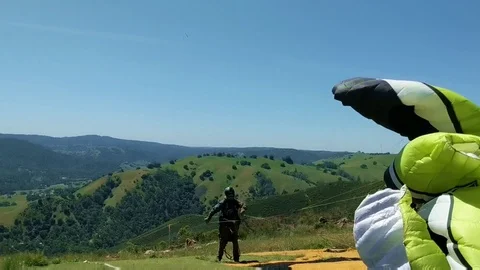 Paraglider having trouble with chute Stock Footage 91641675