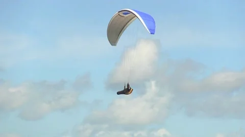 A paraglider hovering in the sky Video stock 11871756