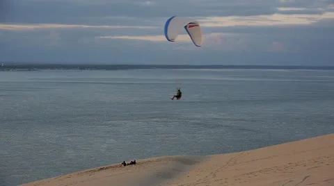 Paraglider hovering at sunset Stock Footage 21924904