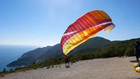 Paraglider Inflating Wing for Take Off Video stock 104863264