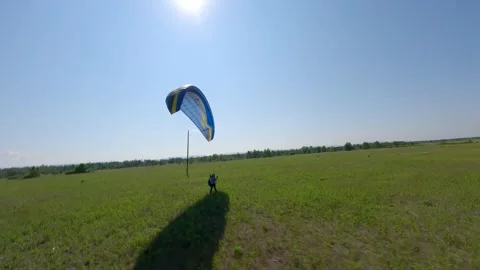 Paraglider landing Stock Footage 246575405