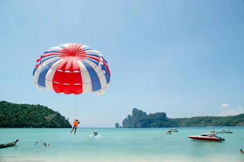 Paraglider lifting off Stock Photos