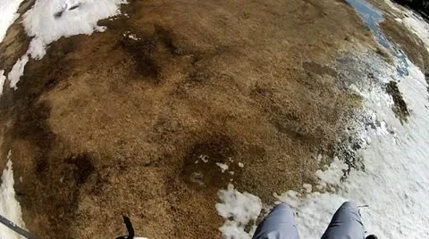 Paraglider making a smooth landing Stock Footage 10909093