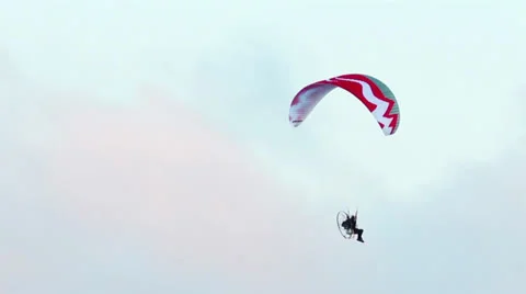 Paraglider with a motor in the sky Stock Footage 23998616