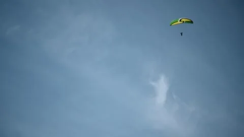 A paraglider in the mountains Stock Footage 217379086
