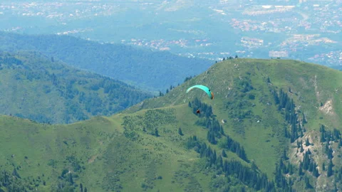 Paraglider in the mountains Stock Footage 321426335