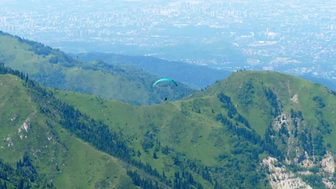 Paraglider in the mountains Stock Footage 329993909