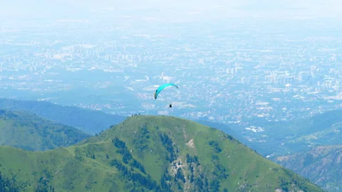 Paraglider in the mountains Stock Footage 334340079