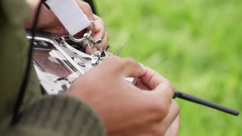 Paraglider operating remote Stock Footage 76005966