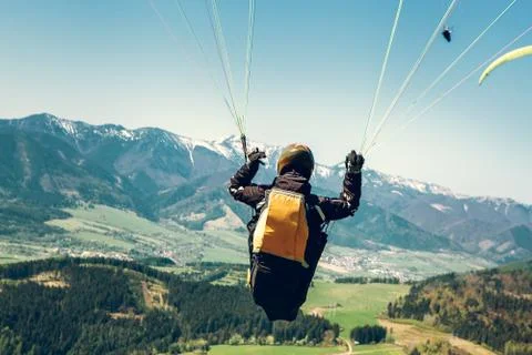 Paraglider is on the paraplane strops - soaring flight moment Stock-Fotos