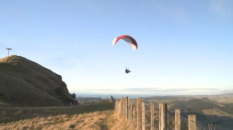 Paraglider passes by Stock Footage 8690978
