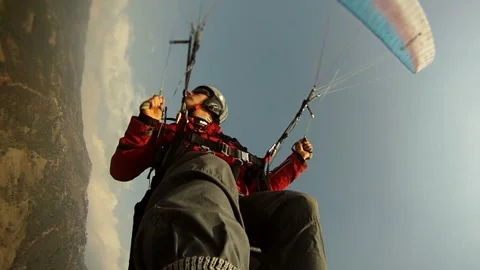 Paraglider pilot performing a spiral dive in the mountains of Nepal 스톡 동영상 169189743