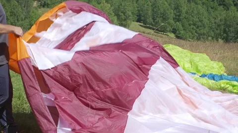 Paraglider Pilot Stretches Canopy Before Flight Stock Footage 304567434