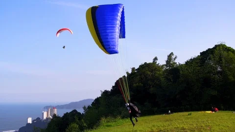 Paraglider Pilot Taking Off From Steep Hill Stock Footage 118136407