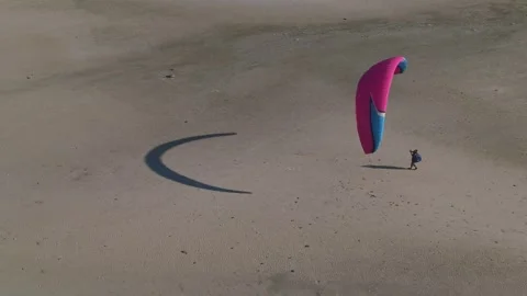 Paraglider Preparing for Takeoff on Sandy Beach  Aerial View Stockbeeldmateriaal 336011279